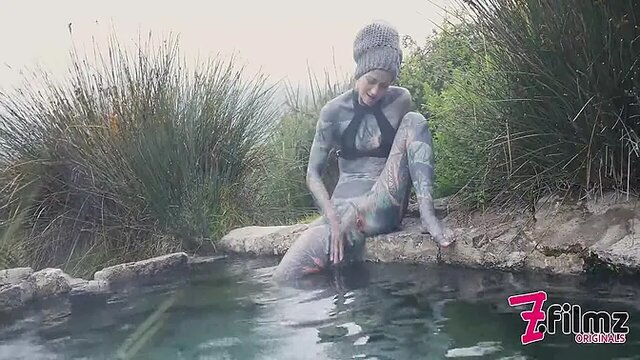 Tattooed beauty gets banged hard in hot spring outdoor public anal