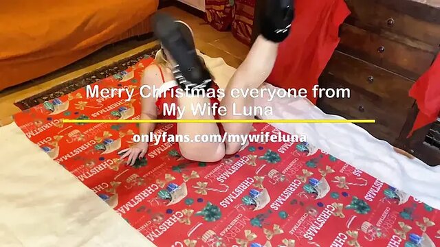Merry Christmas as my wife gives me a blowjob in our living room