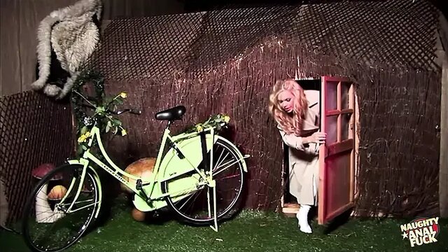 Busty blonde model gets fucked by two guys while a girl watches and masturbates